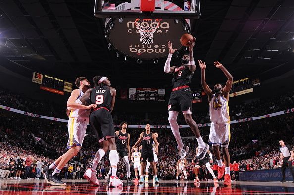 PORTLAND, OR - DECEMBER 17: Deandre Ayton #2 of the Portland Trail Blazers drives to the basket during the game against the Golden State Warriors on December 17, 2023 at the Moda Center Arena in Portland, Oregon. NOTE TO USER: User expressly acknowledges and agrees that, by downloading and or using this photograph, user is consenting to the terms and conditions of the Getty Images License Agreement. Mandatory Copyright Notice: Copyright 2023 NBAE (Photo by Cameron Browne/NBAE via Getty Images)