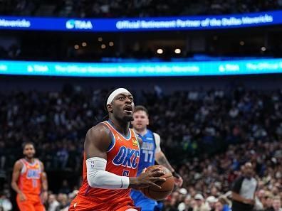 DALLAS, TX - DECEMBER 2: Luguentz Dort #5 of the Oklahoma City Thunder goes to the basket during the game on December 2, 2023 at the American Airlines Center in Dallas, Texas. NOTE TO USER: User expressly acknowledges and agrees that, by downloading and or using this photograph, User is consenting to the terms and conditions of the Getty Images License Agreement. Mandatory Copyright Notice: Copyright 2023 NBAE (Photo by Glenn James/NBAE via Getty Images)