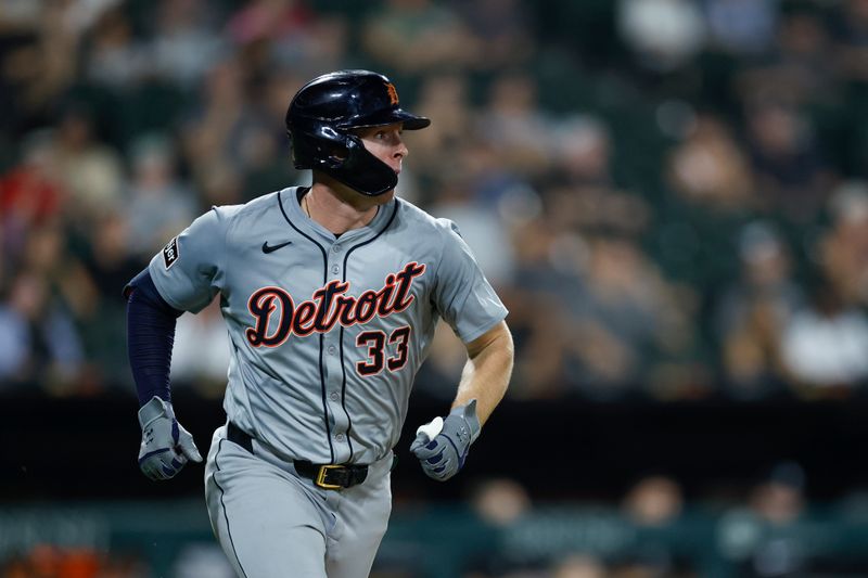 Aug 26, 2024; Chicago, Illinois, USA; Detroit Tigers second baseman Colt Keith (33) runs after hitting a single against the Chicago White Sox during the seventh inning at Guaranteed Rate Field. Mandatory Credit: Kamil Krzaczynski-USA TODAY Sports