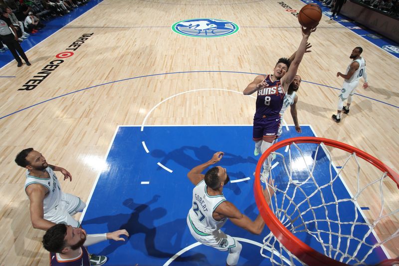 MINNEAPOLIS, MN -  APRIL 14: Grayson Allen #8 of the Phoenix Suns shoots the ball during the game against the Minnesota Timberwolves on April 14, 2024 at Target Center in Minneapolis, Minnesota. NOTE TO USER: User expressly acknowledges and agrees that, by downloading and or using this Photograph, user is consenting to the terms and conditions of the Getty Images License Agreement. Mandatory Copyright Notice: Copyright 2024 NBAE (Photo by Jordan Johnson/NBAE via Getty Images)