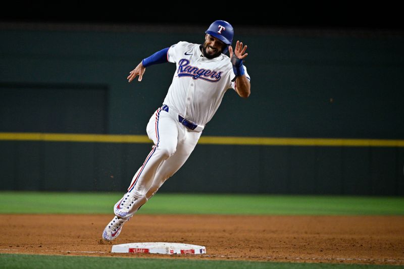 Sep 17, 2024; Arlington, Texas, USA; Texas Rangers second baseman Marcus Semien (2) scores against the Toronto Blue Jays during the fourth inning at Globe Life Field. Mandatory Credit: Jerome Miron-Imagn Images
