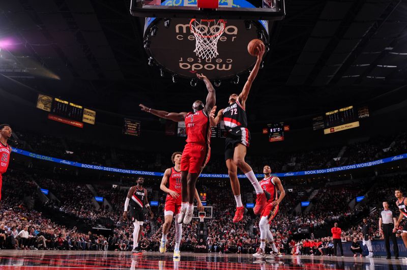 PORTLAND, OR - APRIL 9: Rayan Rupert #72 of the Portland Trail Blazers drives to the basket during the game against the New Orleans Pelicans on April 9, 2024 at the Moda Center Arena in Portland, Oregon. NOTE TO USER: User expressly acknowledges and agrees that, by downloading and or using this photograph, user is consenting to the terms and conditions of the Getty Images License Agreement. Mandatory Copyright Notice: Copyright 2024 NBAE (Photo by Cameron Browne/NBAE via Getty Images)