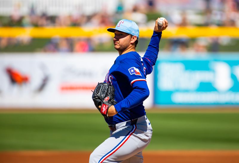 Mar 5, 2024; Peoria, Arizona, USA; Texas Rangers pitcher Owen White against the Seattle Mariners during a spring training baseball game at Peoria Sports Complex. Mandatory Credit: Mark J. Rebilas-USA TODAY Sports