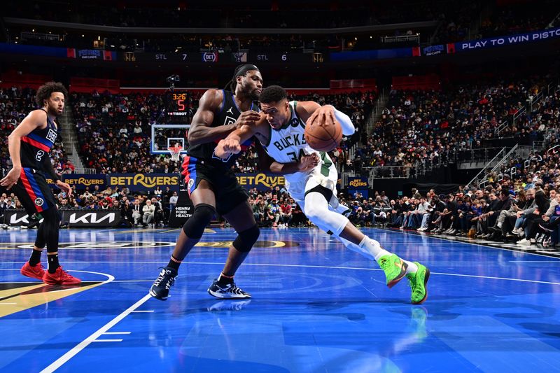 DETROIT, MI - DECEMBER 3: Giannis Antetokounmpo #34 of the Milwaukee Bucks dribbles the ball during the game against the Detroit Pistons during the Emirates NBA Cup game on December 3, 2024 at Little Caesars Arena in Detroit, Michigan. NOTE TO USER: User expressly acknowledges and agrees that, by downloading and/or using this photograph, User is consenting to the terms and conditions of the Getty Images License Agreement. Mandatory Copyright Notice: Copyright 2024 NBAE (Photo by Chris Schwegler/NBAE via Getty Images)