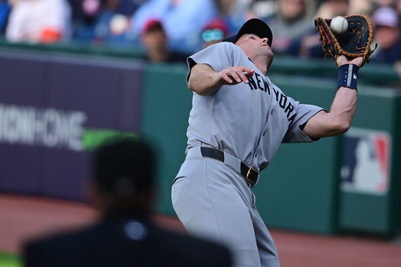 Apr 21, 2025; Cleveland, Ohio, USA; New York Yankees first baseman Paul Goldschmidt (48) catches a ball in foul territory for an out during the first inning against the Cleveland Guardians at Progressive Field. Mandatory Credit: David Dermer-Imagn Images