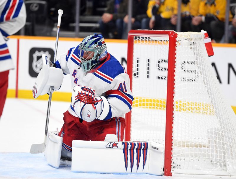 Nov 12, 2022; Nashville, Tennessee, USA; New York Rangers goaltender Jaroslav Halak (41) makes a save during the first period against the Nashville Predators at Bridgestone Arena. Mandatory Credit: Christopher Hanewinckel-USA TODAY Sports