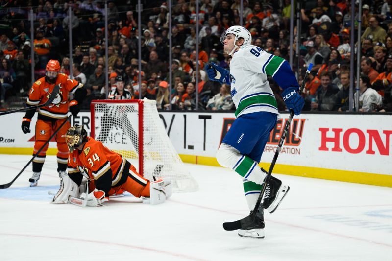 Nov 26, 2025; Anaheim, California, USA; Vancouver Canucks center Linus Karlsson (94) reacts after scoring a goal during the first period against the Anaheim Ducks at Honda Center. Mandatory Credit: William Liang-Imagn Images