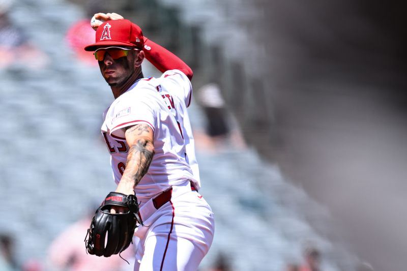 Aug 18, 2024; Anaheim, California, USA; Los Angeles Angels shortstop Zach Neto (9) throws to first base against the Atlanta Braves during the second inning at Angel Stadium. Mandatory Credit: Jonathan Hui-USA TODAY Sports