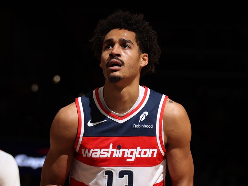 WASHINGTON, DC -? FEBRUARY 12:  Jordan Poole #13 of the Washington Wizards shoots a free throw during the game against the Indiana Pacers on February 12, 2025 at Capital One Arena in Washington, DC. NOTE TO USER: User expressly acknowledges and agrees that, by downloading and or using this Photograph, user is consenting to the terms and conditions of the Getty Images License Agreement. Mandatory Copyright Notice: Copyright 2025 NBAE (Photo by Stephen Gosling/NBAE via Getty Images)