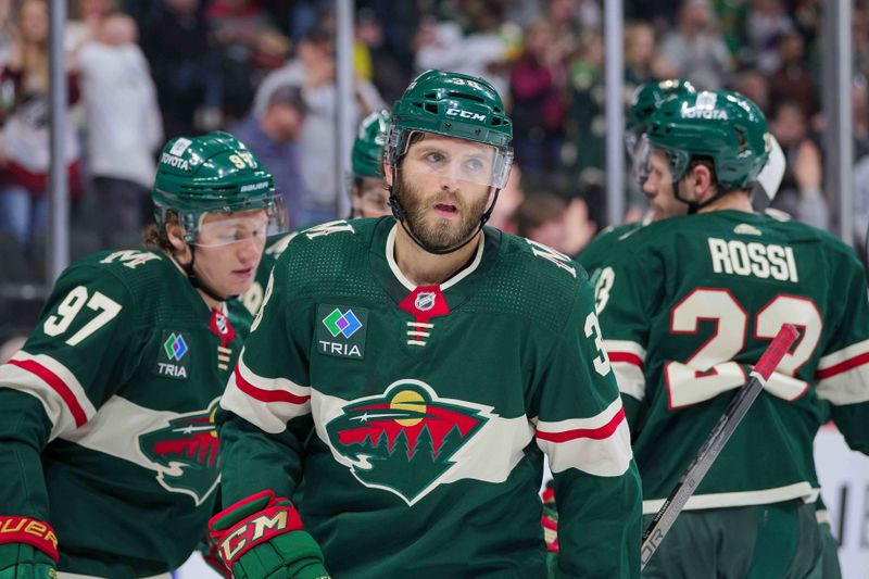 Mar 12, 2024; Saint Paul, Minnesota, USA; Minnesota Wild right wing Ryan Hartman (38) celebrates his goal against the Arizona Coyotes in the second period at Xcel Energy Center. Mandatory Credit: Brad Rempel-USA TODAY Sports