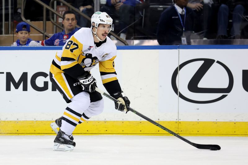 Dec 6, 2024; New York, New York, USA; Pittsburgh Penguins center Sidney Crosby (87) skates with the puck against the New York Rangers during the second period at Madison Square Garden. Mandatory Credit: Brad Penner-Imagn Images