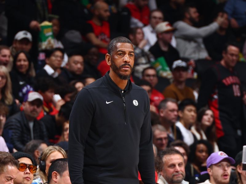 TORONTO, CANADA - FEBRUARY 22: Head Coach Kevin Ollie of the Brooklyn Nets looks on during the game against the Toronto Raptors on February 22, 2024 at the Scotiabank Arena in Toronto, Ontario, Canada.  NOTE TO USER: User expressly acknowledges and agrees that, by downloading and or using this Photograph, user is consenting to the terms and conditions of the Getty Images License Agreement.  Mandatory Copyright Notice: Copyright 2024 NBAE (Photo by Vaughn Ridley/NBAE via Getty Images)