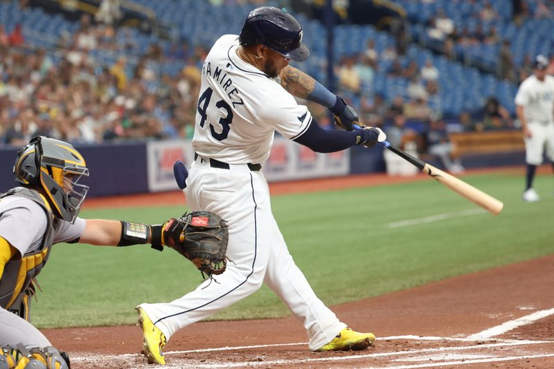 May 30, 2024; St. Petersburg, Florida, USA; Tampa Bay Rays outfielder Harold Ramírez (43) singles against the Oakland Athletics during the first inning at Tropicana Field. Mandatory Credit: Kim Klement Neitzel-USA TODAY Sports