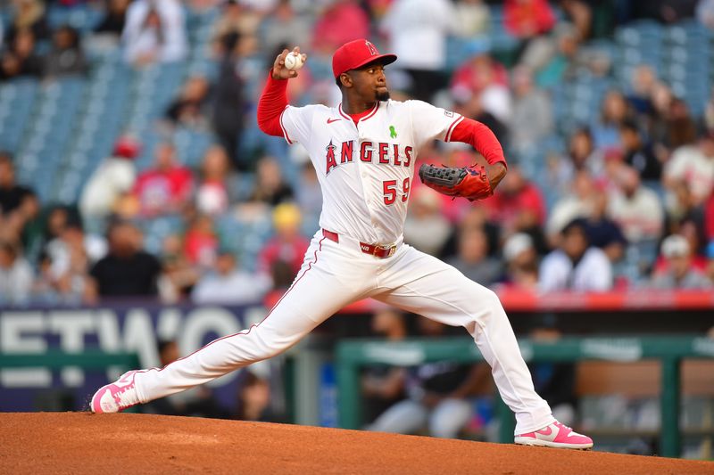 May 24, 2025; Anaheim, California, USA; Los Angeles Angels pitcher Jose Soriano (59) throws against the Miami Marlins during the first inning at Angel Stadium. Mandatory Credit: Gary A. Vasquez-Imagn Images