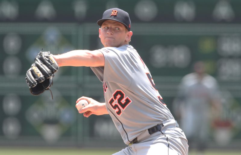 Jul 23, 2025; Pittsburgh, Pennsylvania, USA;  Detroit Tigers starting pitcher Troy Melton (52) delivers a pitch in his major league debut during the first inning against the Pittsburgh Pirates at PNC Park. Mandatory Credit: Charles LeClaire-Imagn Images