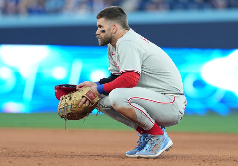 Jun 3, 2025; Toronto, Ontario, CAN; Philadelphia Phillies first baseman Bryce Harper (3) waits for the play to begin against the Toronto Blue Jays during the fifth inning at Rogers Centre. Mandatory Credit: Nick Turchiaro-Imagn Images