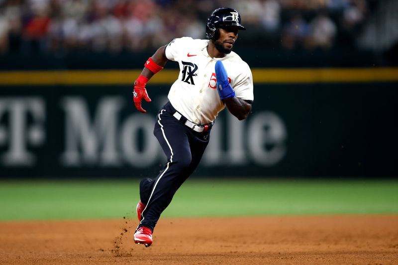 Sep 2, 2023; Arlington, Texas, USA; Texas Rangers left fielder J.P. Martinez (50) runs to third base in the fourth inning against the Minnesota Twins at Globe Life Field. Mandatory Credit: Tim Heitman-USA TODAY Sports