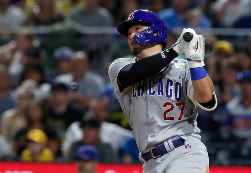 Aug 26, 2023; Pittsburgh, Pennsylvania, USA;  Chicago Cubs right fielder Seiya Suzuki (27) hits a two-run double against the Pittsburgh Pirates during the ninth inning at PNC Park. Mandatory Credit: Charles LeClaire-USA TODAY Sports