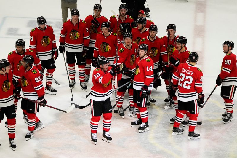 Apr 13, 2023; Chicago, Illinois, USA; Chicago Blackhawks center Jonathan Toews (19) is honored after the game against the Philadelphia Flyers. He played his last game as a Blackhawk, at United Center. Mandatory Credit: David Banks-USA TODAY Sports