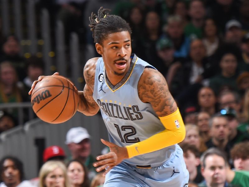 BOSTON, MA - FEBUARY 12:  Ja Morant #12 of the Memphis Grizzlies goes to the basket during the game  on Febuary 12, 2023 at the TD Garden in Boston, Massachusetts.  NOTE TO USER: User expressly acknowledges and agrees that, by downloading and or using this photograph, User is consenting to the terms and conditions of the Getty Images License Agreement. Mandatory Copyright Notice: Copyright 2023 NBAE  (Photo by Brian Babineau/NBAE via Getty Images)