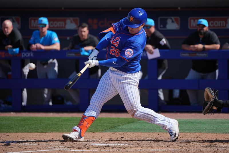 Feb 27, 2024; Port St. Lucie, Florida, USA;  New York Mets first baseman Ji-Man Choi (26) hits a solo home run in the sixth inning against the Miami Marlins at Clover Park. Mandatory Credit: Jim Rassol-USA TODAY Sports