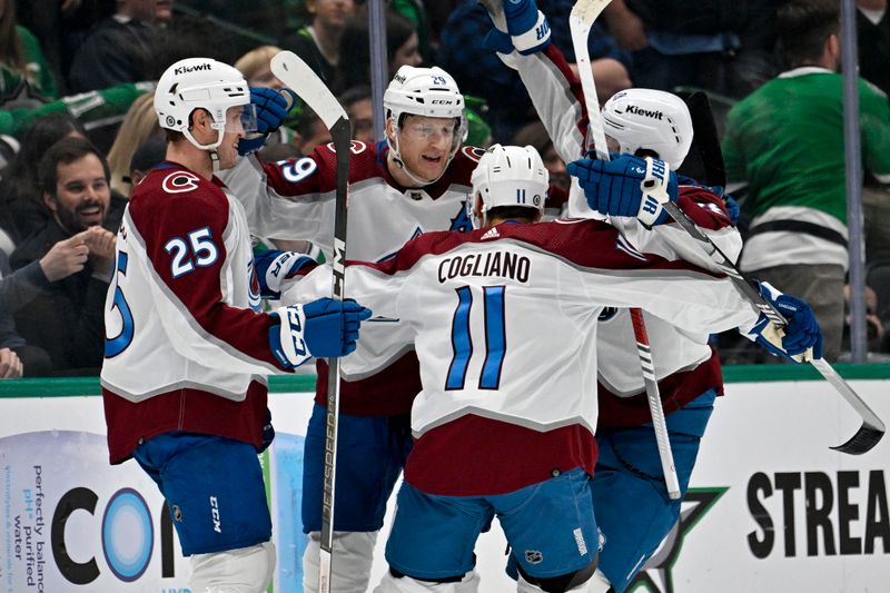 Jan 4, 2024; Dallas, Texas, USA; Colorado Avalanche right wing Logan O'Connor (25) and center Nathan MacKinnon (29) and center Andrew Cogliano (11) celebrates the game winning goal scored by MacKinnon during the overtime period against the Dallas Stars at the American Airlines Center. Mandatory Credit: Jerome Miron-USA TODAY Sports