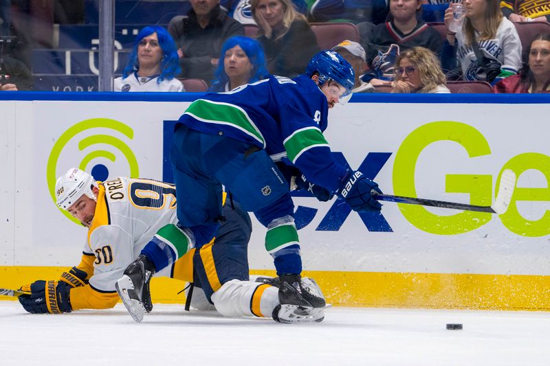 Apr 23, 2024; Vancouver, British Columbia, CAN; Vancouver Canucks forward Conor Garland (8) checks Nashville Predators forward Ryan O'Reilly (90) during the second period in game two of the first round of the 2024 Stanley Cup Playoffs at Rogers Arena. Mandatory Credit: Bob Frid-USA TODAY Sports