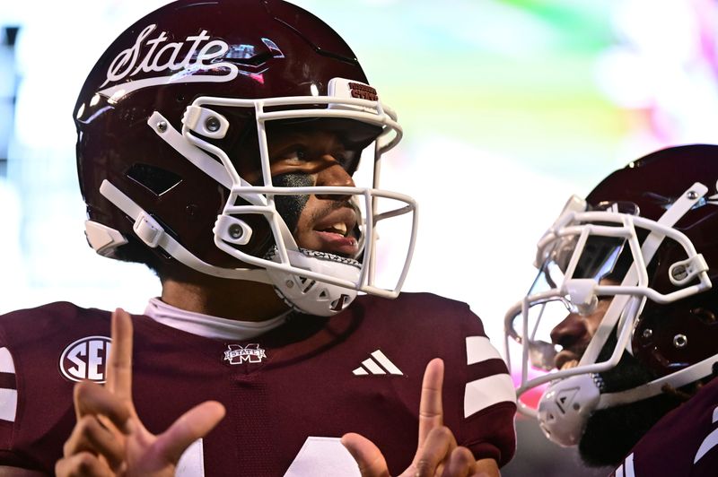 Sep 30, 2023; Starkville, Mississippi, USA; Mississippi State Bulldogs quarterback Mike Wright (14) reacts after a touchdown against the Alabama Crimson Tide during the second quarter at Davis Wade Stadium at Scott Field. Mandatory Credit: Matt Bush-USA TODAY Sports