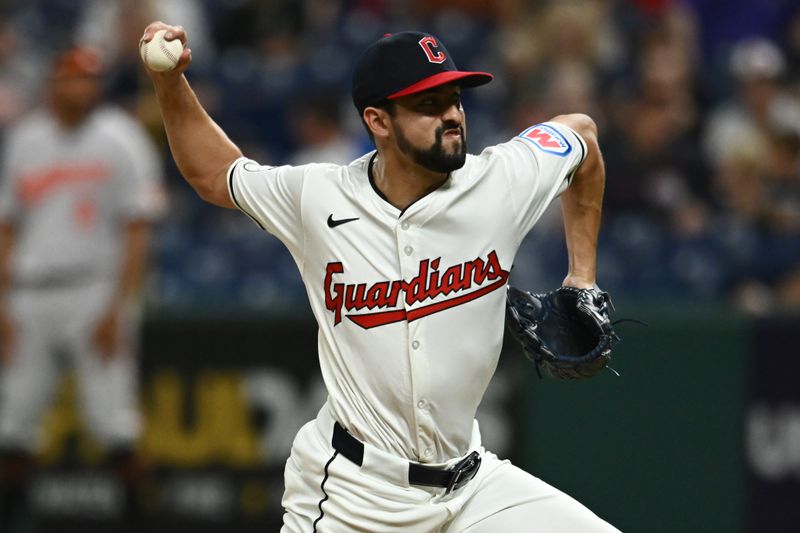 Aug 1, 2024; Cleveland, Ohio, USA; Cleveland Guardians relief pitcher Nick Sandlin (52) throws a pitch during the ninth inning against the Baltimore Orioles at Progressive Field. Mandatory Credit: Ken Blaze-USA TODAY Sports