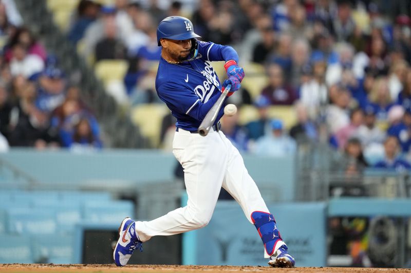 Mar 25, 2024; Los Angeles, California, USA; Los Angeles Dodgers right fielder Mookie Betts (50) bats against the Los Angeles Angels at Dodger Stadium. Mandatory Credit: Kirby Lee-USA TODAY Sports