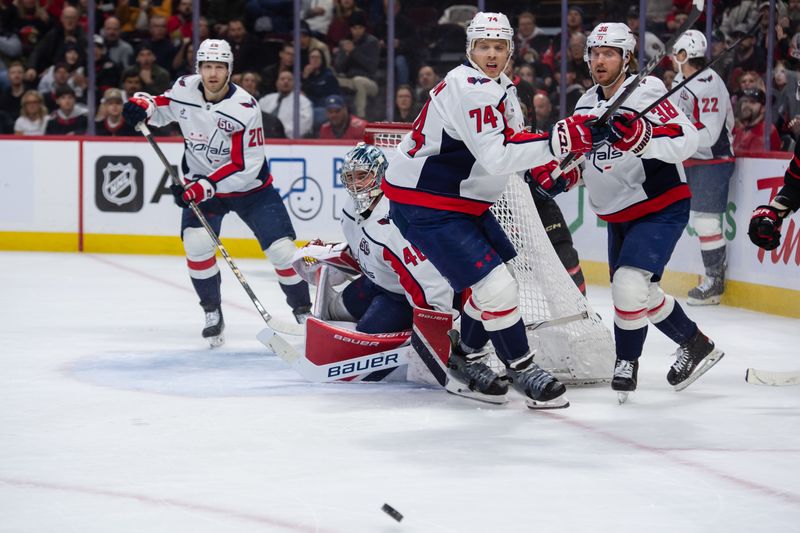 Jan 16, 2025; Ottawa, Ontario, CAN; Washington Capitals defenseman John Carlson (74) follows the puck in the first period against the Ottawa Senators at the Canadian Tire Centre. Mandatory Credit: Marc DesRosiers-Imagn Images