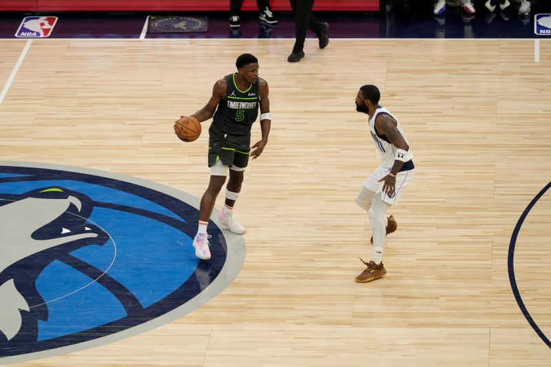 MINNEAPOLIS, MN - MAY 30: Anthony Edwards #5 of the Minnesota Timberwolves dribbles the ball during the game against the Dallas Mavericks during Game 5 of the Western Conference Finals of the 2024 NBA Playoffs on May 30, 2024 at Target Center in Minneapolis, Minnesota. NOTE TO USER: User expressly acknowledges and agrees that, by downloading and or using this Photograph, user is consenting to the terms and conditions of the Getty Images License Agreement. Mandatory Copyright Notice: Copyright 2024 NBAE (Photo by Jordan Johnson/NBAE via Getty Images)