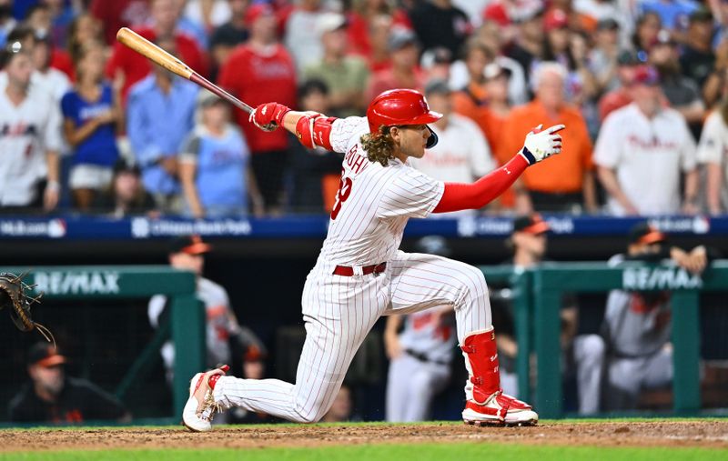 Jul 25, 2023; Philadelphia, Pennsylvania, USA; Philadelphia Phillies infielder Alec Bohm (28) hits a game-winning RBI single against the Baltimore Orioles in the ninth inning at Citizens Bank Park. Mandatory Credit: Kyle Ross-USA TODAY Sports