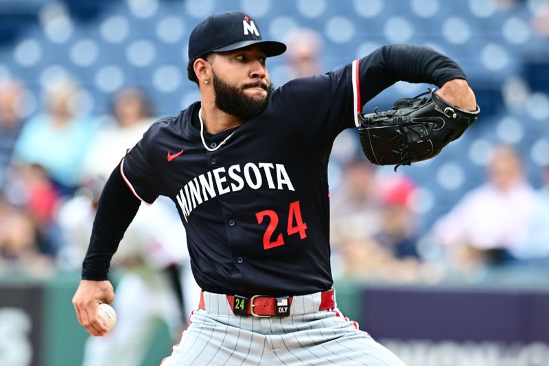 May 1, 2025; Cleveland, Ohio, USA; Minnesota Twins starting pitcher Simeon Woods Richardson (24) throws a pitch during the first inning against the Cleveland Guardians at Progressive Field. Mandatory Credit: Ken Blaze-Imagn Images

