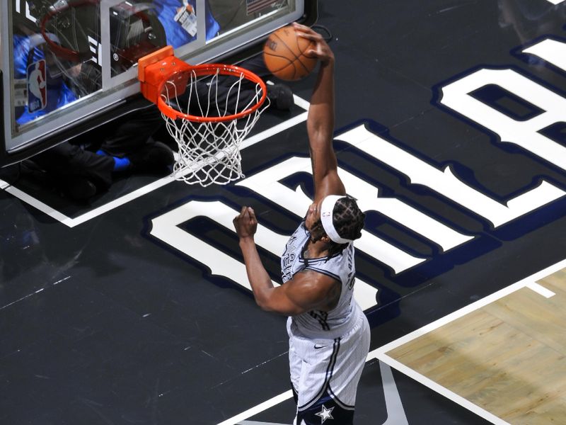 ORLANDO, FL - NOVEMBER 27: Wendell Carter Jr. #34 of the Orlando Magic dunks the ball during the game against the Chicago Bulls on November 27, 2024 at Kia Center in Orlando, Florida. NOTE TO USER: User expressly acknowledges and agrees that, by downloading and or using this photograph, User is consenting to the terms and conditions of the Getty Images License Agreement. Mandatory Copyright Notice: Copyright 2024 NBAE (Photo by Fernando Medina/NBAE via Getty Images)