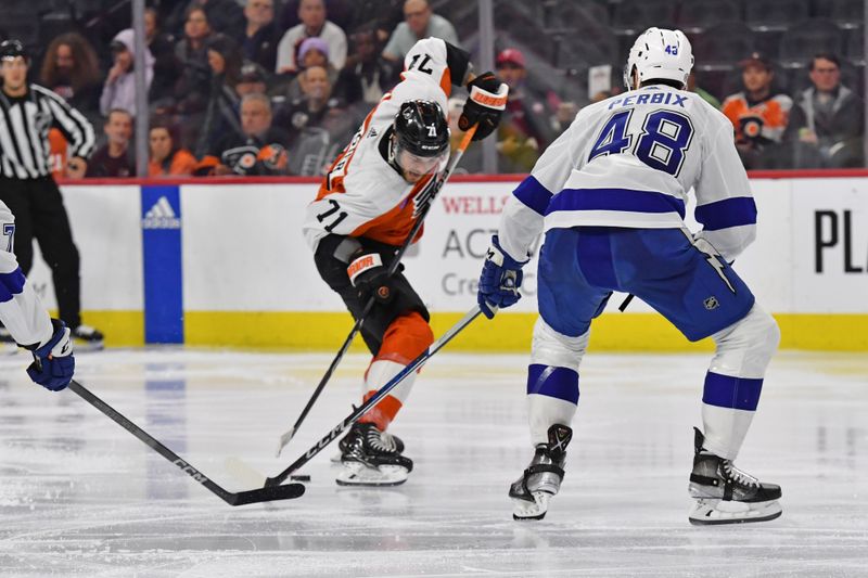 Feb 27, 2024; Philadelphia, Pennsylvania, USA; Philadelphia Flyers right wing Tyson Foerster (71) makes a move against Tampa Bay Lightning defenseman Nick Perbix (48) during the third period at Wells Fargo Center. Mandatory Credit: Eric Hartline-USA TODAY Sports