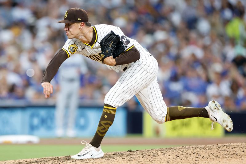 Jul 31, 2024; San Diego, California, USA; San Diego Padres relief pitcher Alek Jacob (37) pitches during the seventh inning against the Los Angeles Dodgers at Petco Park. Mandatory Credit: David Frerker-USA TODAY Sports