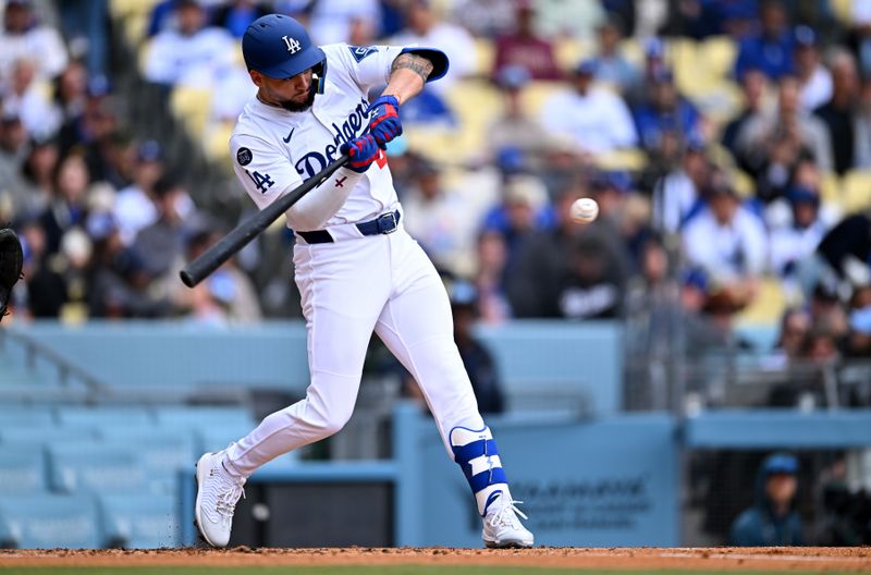 Apr 27, 2025; Los Angeles, California, USA; Los Angeles Dodgers outfielder Andy Pages (44) hits a RBI single during the first inning against the Pittsburgh Pirates at Dodger Stadium. Mandatory Credit: Jonathan Hui-Imagn Images