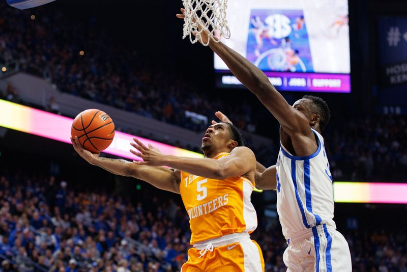 Feb 18, 2023; Lexington, Kentucky, USA; Tennessee Volunteers guard Zakai Zeigler (5) goes to the basket during the first half against the Kentucky Wildcats at Rupp Arena at Central Bank Center. Mandatory Credit: Jordan Prather-USA TODAY Sports