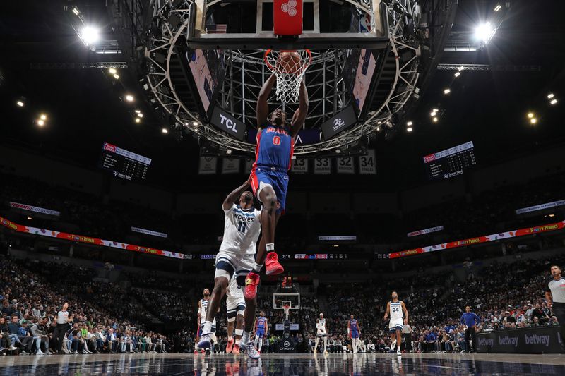 MINNEAPOLIS, MN -  MARCH 27:  Jalen Duren #0 of the Detroit Pistons dunks the ball during the game against the Minnesota Timberwolves on March 27, 2024 at Target Center in Minneapolis, Minnesota. NOTE TO USER: User expressly acknowledges and agrees that, by downloading and or using this Photograph, user is consenting to the terms and conditions of the Getty Images License Agreement. Mandatory Copyright Notice: Copyright 2024 NBAE (Photo by Jordan Johnson/NBAE via Getty Images)