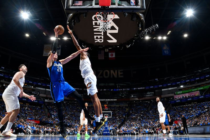 ORLANDO, FL - APRIL 27: Moritz Wagner #21 of the Orlando Magic drives to the basket during the game against the Cleveland Cavaliers during Round 1 Game 4 of the 2024 NBA Playoffs on April 27, 2024 at the Kia Center in Orlando, Florida. NOTE TO USER: User expressly acknowledges and agrees that, by downloading and or using this photograph, User is consenting to the terms and conditions of the Getty Images License Agreement. Mandatory Copyright Notice: Copyright 2024 NBAE (Photo by Fernando Medina/NBAE via Getty Images)