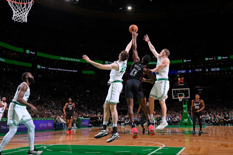 BOSTON, MA - MARCH 18: Jalen Duren #0 of the Detroit Pistons grabs a rebound during the game against the Boston Celtics on March 18, 2024 at the TD Garden in Boston, Massachusetts. NOTE TO USER: User expressly acknowledges and agrees that, by downloading and or using this photograph, User is consenting to the terms and conditions of the Getty Images License Agreement. Mandatory Copyright Notice: Copyright 2024 NBAE  (Photo by Brian Babineau/NBAE via Getty Images)