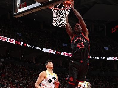 TORONTO, CANADA - DECEMBER 23:  Pascal Siakam #43 of the Toronto Raptors drives to the basket during the game against the Utah Jazz on December 23, 2023 at the Scotiabank Arena in Toronto, Ontario, Canada.  NOTE TO USER: User expressly acknowledges and agrees that, by downloading and or using this Photograph, user is consenting to the terms and conditions of the Getty Images License Agreement.  Mandatory Copyright Notice: Copyright 2023 NBAE (Photo by Vaughn Ridley/NBAE via Getty Images)