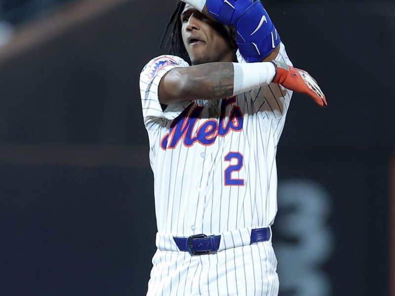 Sep 17, 2024; New York City, New York, USA; New York Mets shortstop Luisangel Acuna (2) reacts after hitting an RBI double against the Washington Nationals during the third inning at Citi Field. Mandatory Credit: Brad Penner-Imagn Images