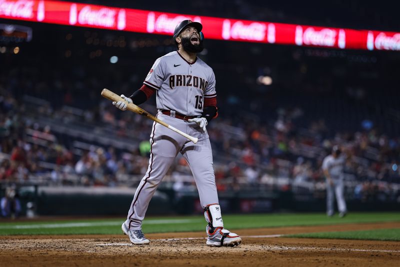 Jun 7, 2023; Washington, District of Columbia, USA; Arizona Diamondbacks third baseman Emmanuel Rivera (15) reacts after fouling a pitch against the Washington Nationals during the seventh inning at Nationals Park. Mandatory Credit: Scott Taetsch-USA TODAY Sports