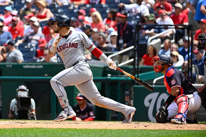 May 7, 2025; Washington, District of Columbia, USA; Cleveland Guardians second baseman Gabriel Arias (13) singles against the Washington Nationals during the sixth inning at Nationals Park. Mandatory Credit: Brad Mills-Imagn Images