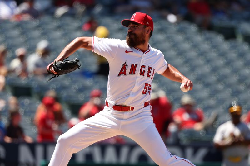 Jun 26, 2024; Anaheim, California, USA;  Los Angeles Angels relief pitcher Matt Moore (55) pitches during the sixth inning against the Oakland Athletics at Angel Stadium. Mandatory Credit: Kiyoshi Mio-USA TODAY Sports