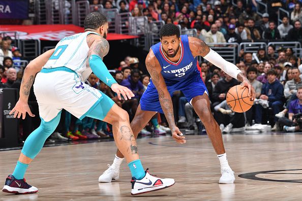 LOS ANGELES, CA - DECEMBER 26:  Paul George #13 of the LA Clippers handles the ball during the game  on December 26, 2023 at Crypto.Com Arena in Los Angeles, California. NOTE TO USER: User expressly acknowledges and agrees that, by downloading and/or using this Photograph, user is consenting to the terms and conditions of the Getty Images License Agreement. Mandatory Copyright Notice: Copyright 2023 NBAE (Photo by Juan Ocampo/NBAE via Getty Images)