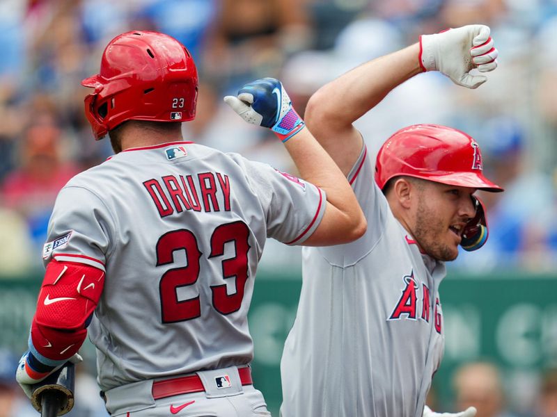 Jun 18, 2023; Kansas City, Missouri, USA; Los Angeles Angels center fielder Mike Trout (right) celebrates with first baseman Brandon Drury (23) after hitting a home run during the fifth inning against the Kansas City Royals at Kauffman Stadium. Mandatory Credit: Jay Biggerstaff-USA TODAY Sports