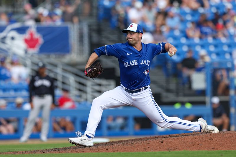 Mar 12, 2024; Dunedin, Florida, USA;  Toronto Blue Jays pitcher Brandon Eisert (79) throws a pitch against the New York Yankees in the eighth inning at TD Ballpark. Mandatory Credit: Nathan Ray Seebeck-USA TODAY Sports